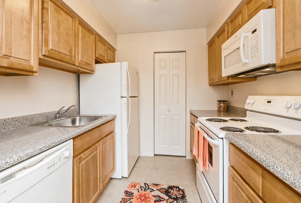 Spacious kitchen with wooden cabinetry in West Lawn, PA