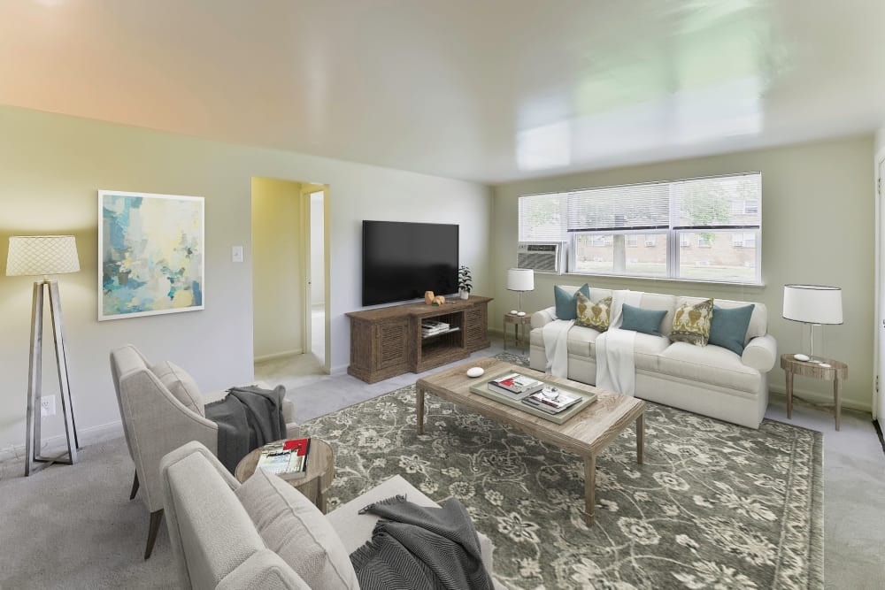 Carpeted Living Area with Cozy Sofas and Decorative Pillows at Wedgewood Hills Apartment Homes in Harrisburg, Pennsylvania