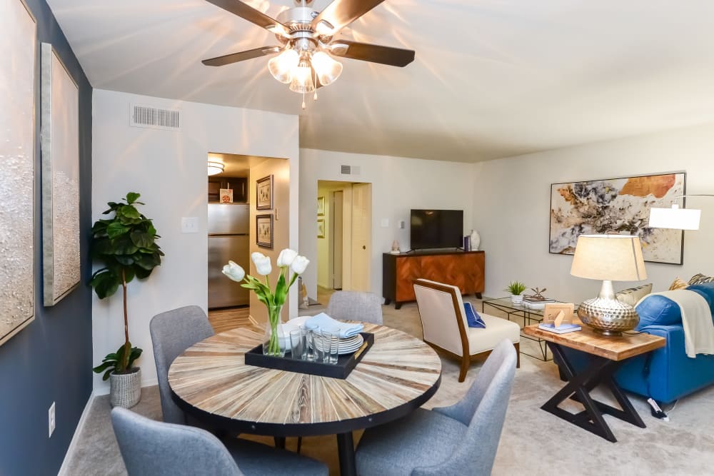 Modern Living Room with Ceiling Fan at Sherwood Crossing Apartments & Townhomes in Philadelphia, Pennsylvania