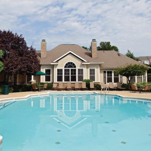 Clubhouse with Swimming Pool at Village at Potomac Falls Apartment Homes in Sterling, Virginia