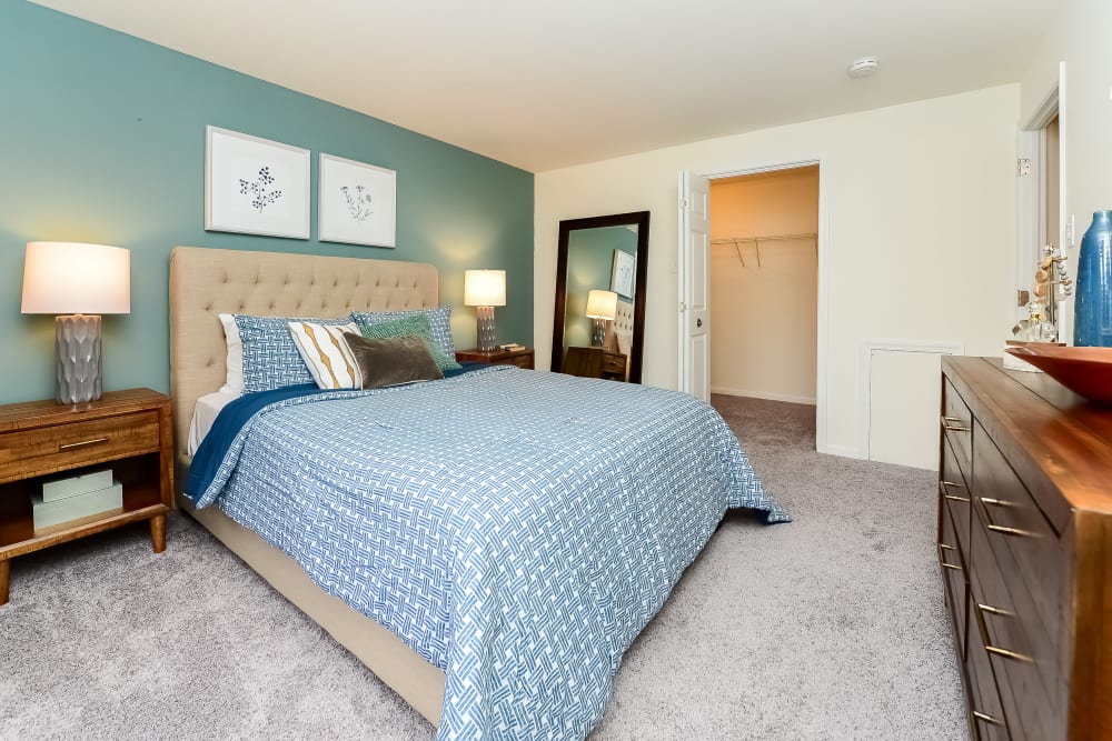 Spacious bedroom with plush carpeting at Chesterfield Apartment Homes in Levittown, Pennsylvania
