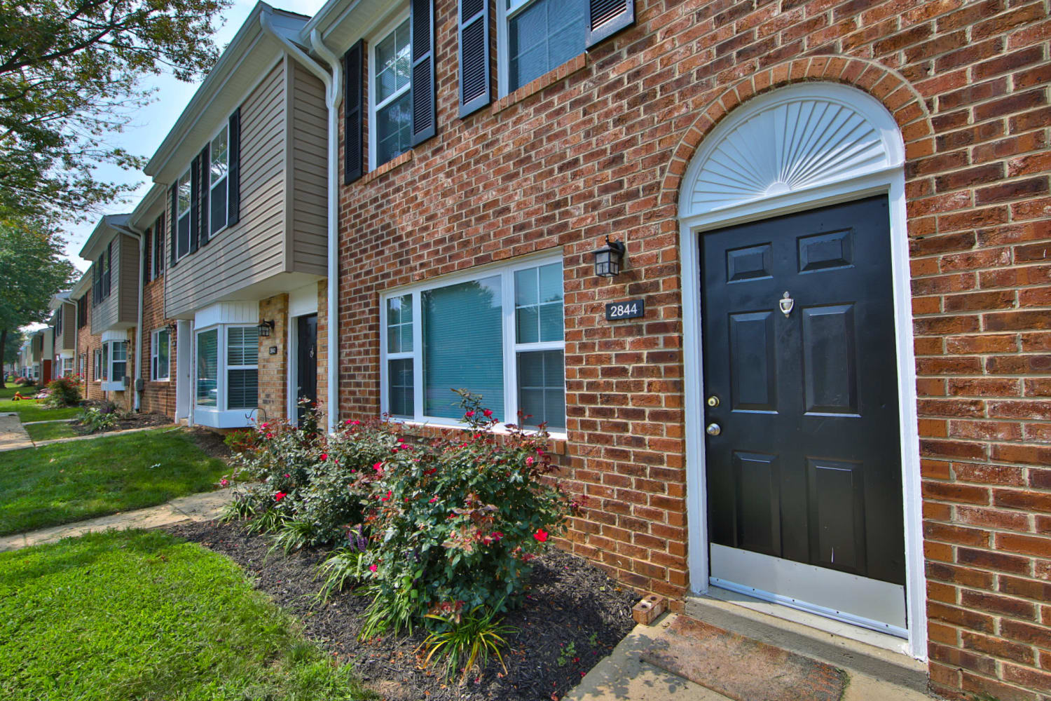 Exterior view of townhomes at The Townhomes at Diamond Ridge in Baltimore, Maryland