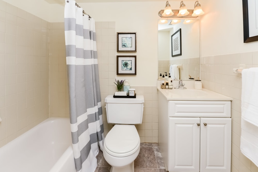 Bathroom Complete with Soaking Tub and Vanity Area at Chesterfield Apartment Homes in Levittown, Pennsylvania