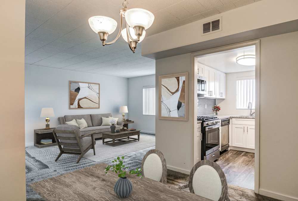 Dining room with view of living space at The Avalon Apartment Homes in Avalon, Pennsylvania