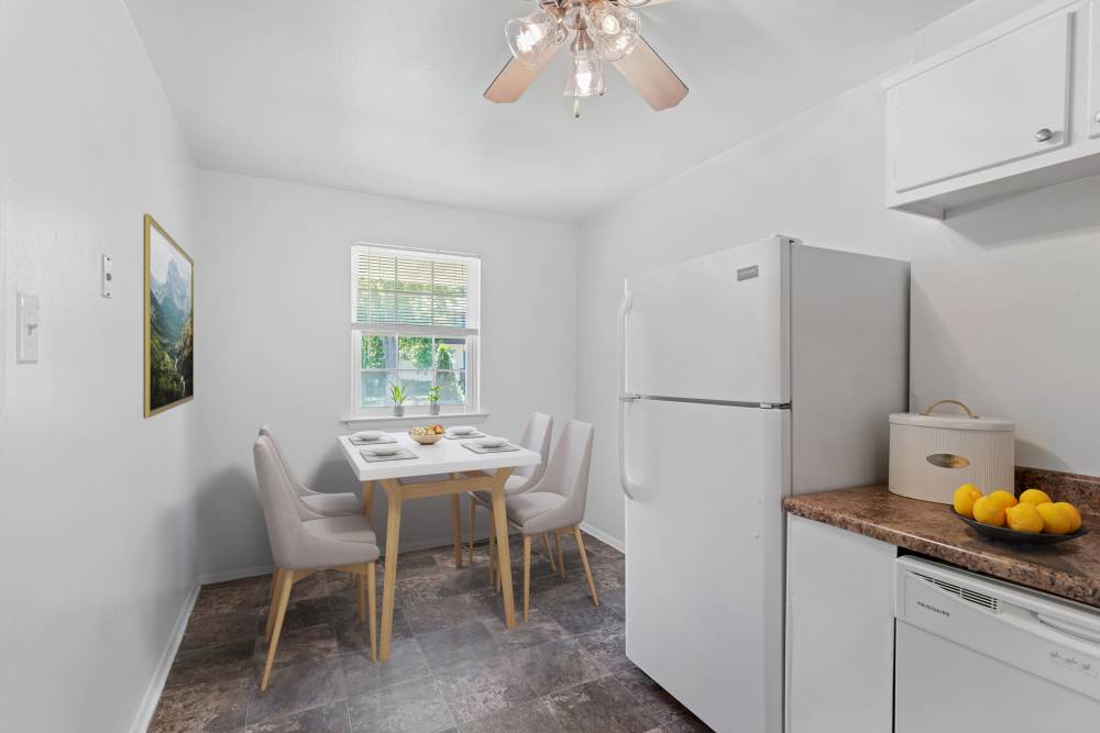 Kitchen with white appliances at Burnt Mill Apartment Homes in Voorhees, New Jersey
