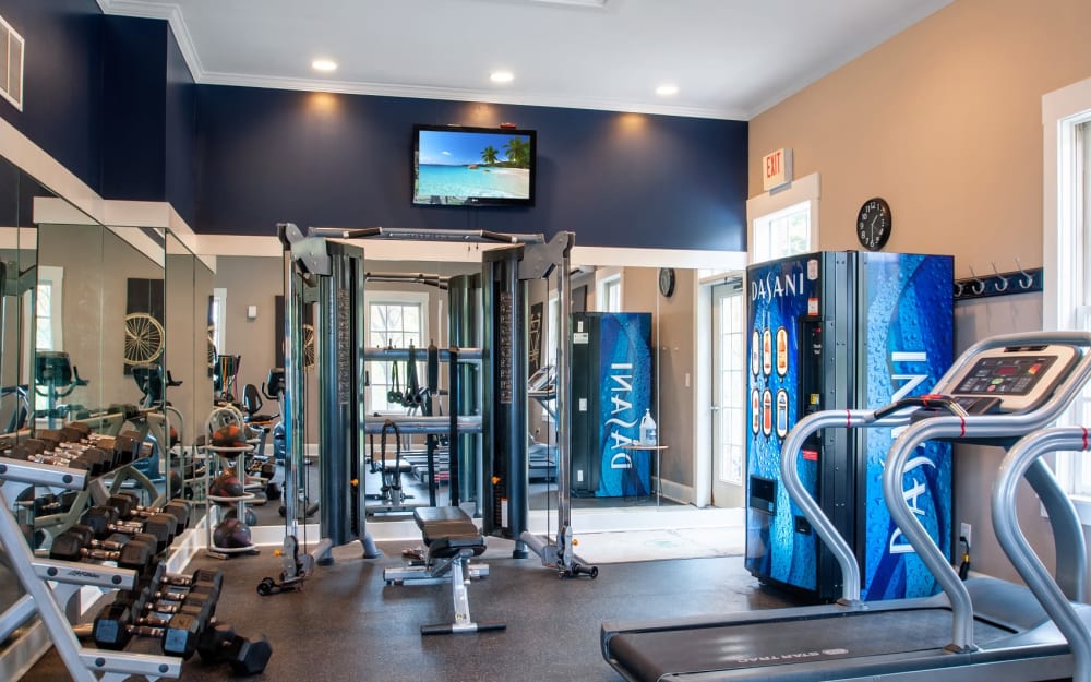 Well-equipped fitness center with cardio equipment at Christopher Wren Apartments & Townhomes in Wexford, Pennsylvania