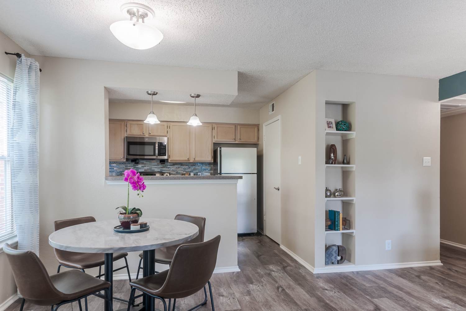 Bright kitchen and dinning room at Club at North Hills in Pittsburgh, Pennsylvania