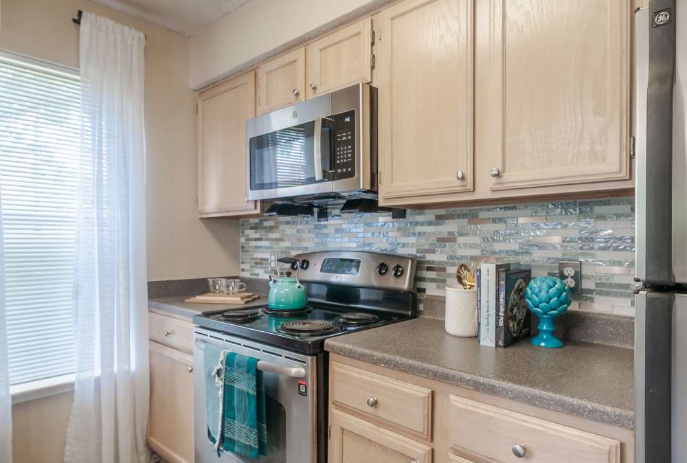 Kitchen with stainless steel appliances at Club at North Hills in Pittsburgh, Pennsylvania