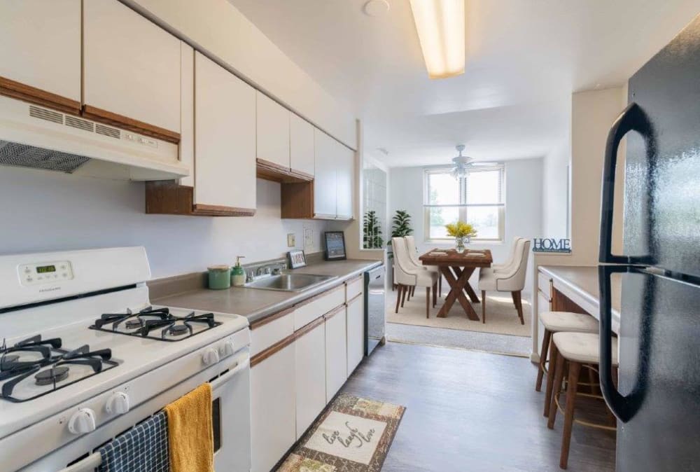 Fully-Equipped Kitchen Next to Dining Area at Summit Pointe in Scranton, Pennsylvania