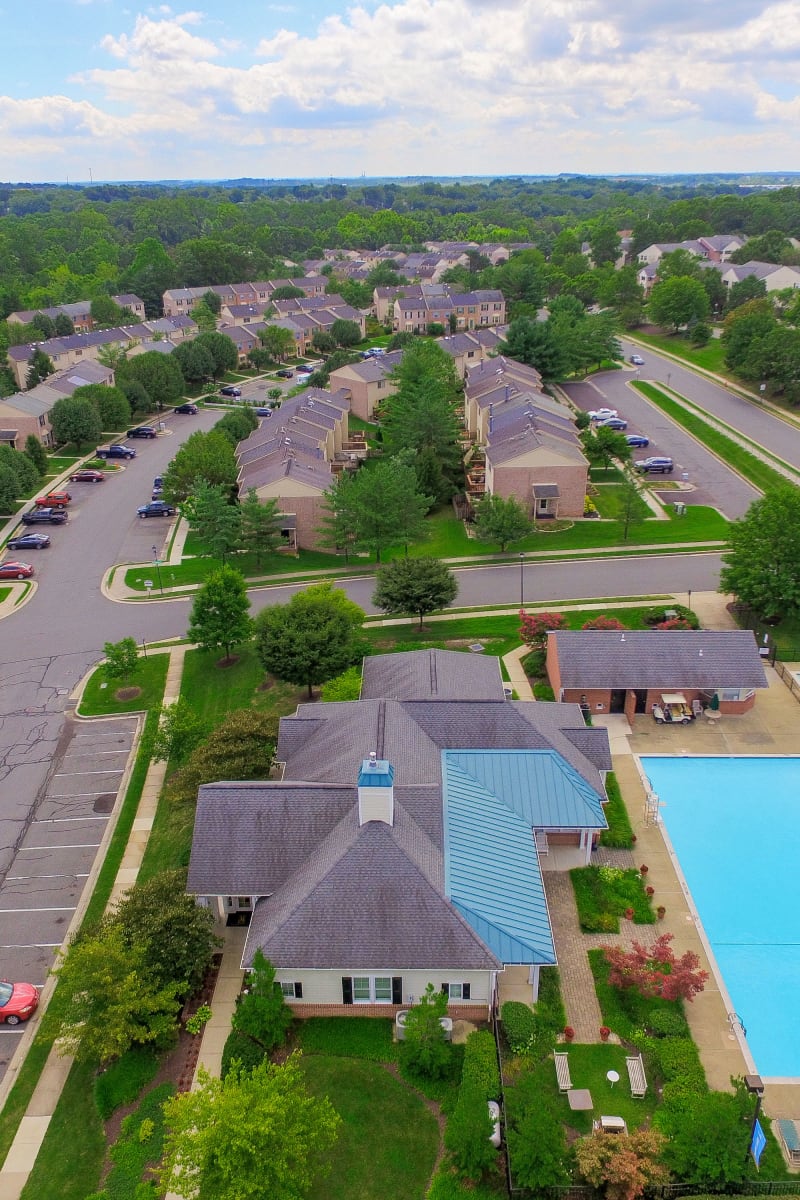Exterior of Silver Spring Station Apartment Homes on a sunny spring day in Baltimore, Maryland