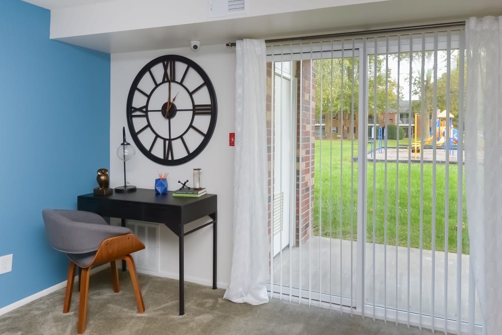 Spacious living room with porch at Mapleton Square Apartment Homes in Dover, DE