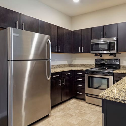 Kitchen with stainless steel appliances at Reserve at Southpointe in Canonsburg, Pennsylvania