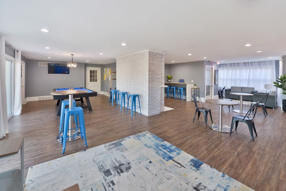 Large living rooms with access to to the backyard located at King's Manor Apartments in Harrisburg, Pennsylvania