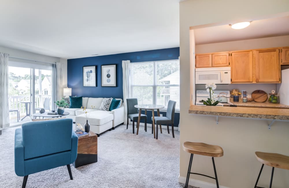 Fully equipped kitchen with a breakfast bar at Fox Run Apartments & Townhomes in Bear, Delaware