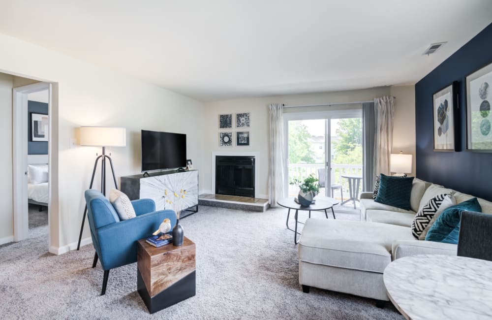 Living room with fireplace at Fox Run Apartments & Townhomes in Bear, DE