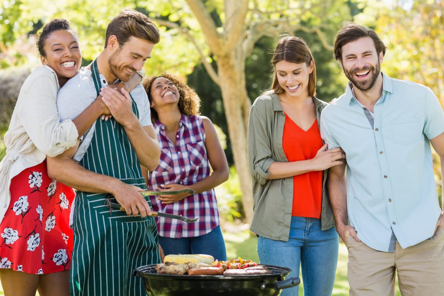 Residents and friends grilling at The Docks Apartments & Townhomes in Pittsburgh, Pennsylvania