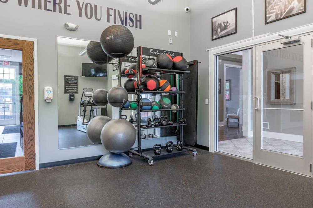 Fitness Studio With Large Mirror at Torrente Apartment Homes in Upper St Clair, Pennsylvania