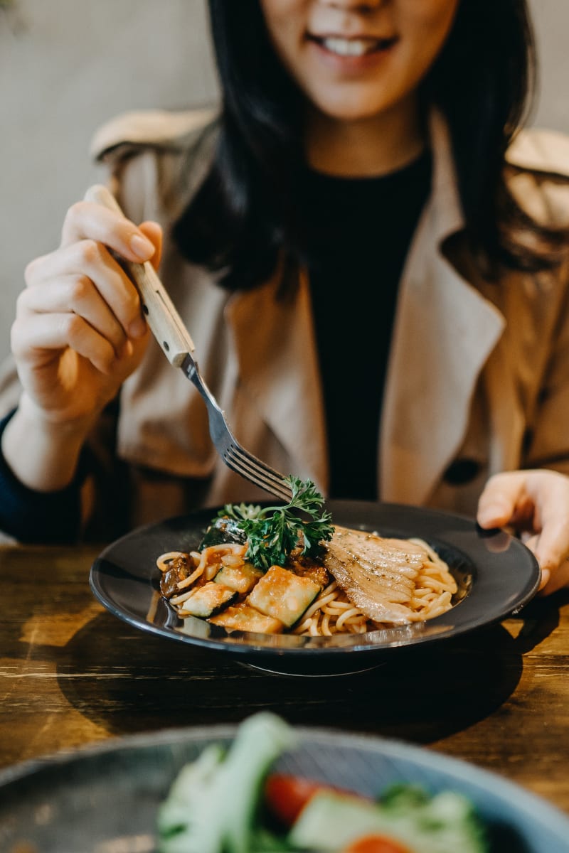 Resident having lunch at a local cafe near Emerald Pointe Townhomes in Harrisburg, Pennsylvania