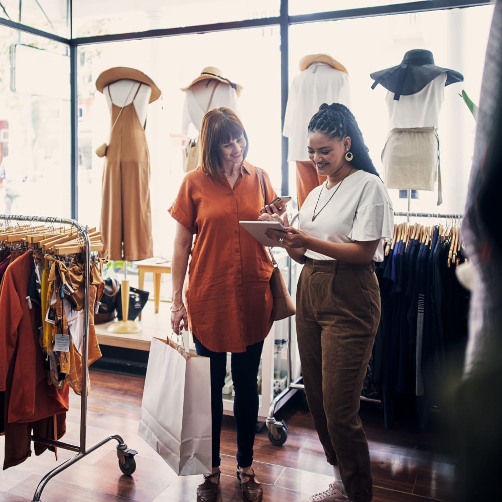 Resident shopping at a local boutique near Squires Manor Apartment Homes in South Park, Pennsylvania