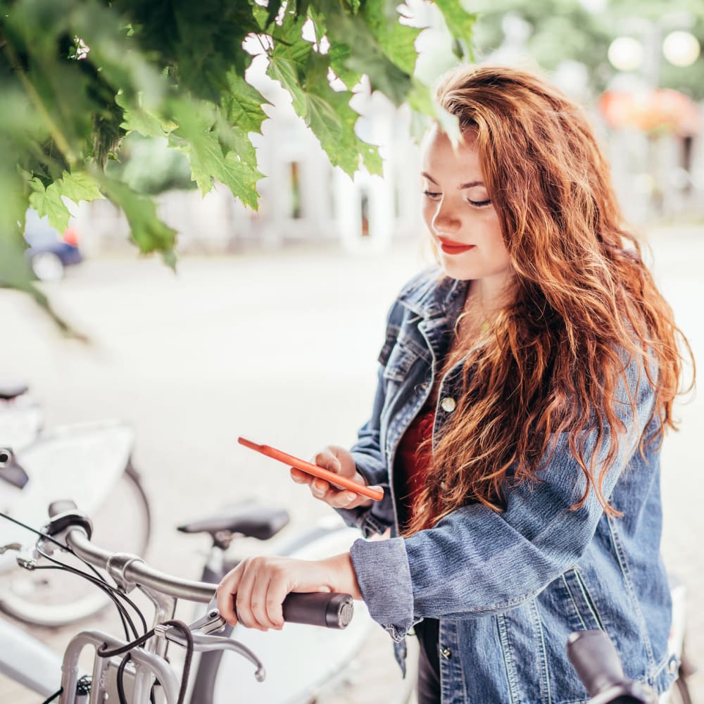 Resident parking her bike near Lumberton Apartment Homes in Lumberton, New Jersey