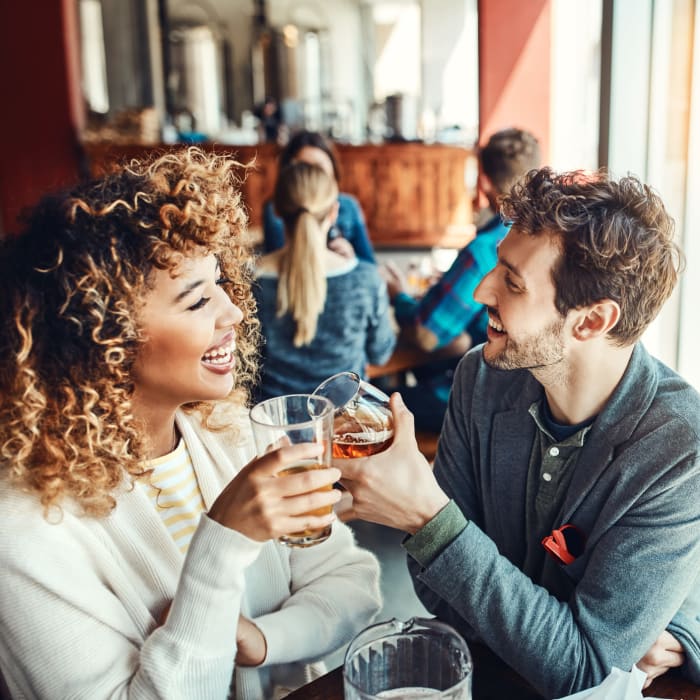 Residents enjoying a beer at a local craft brewery near Woodview at Marlton Apartment Homes in Marlton, New Jersey