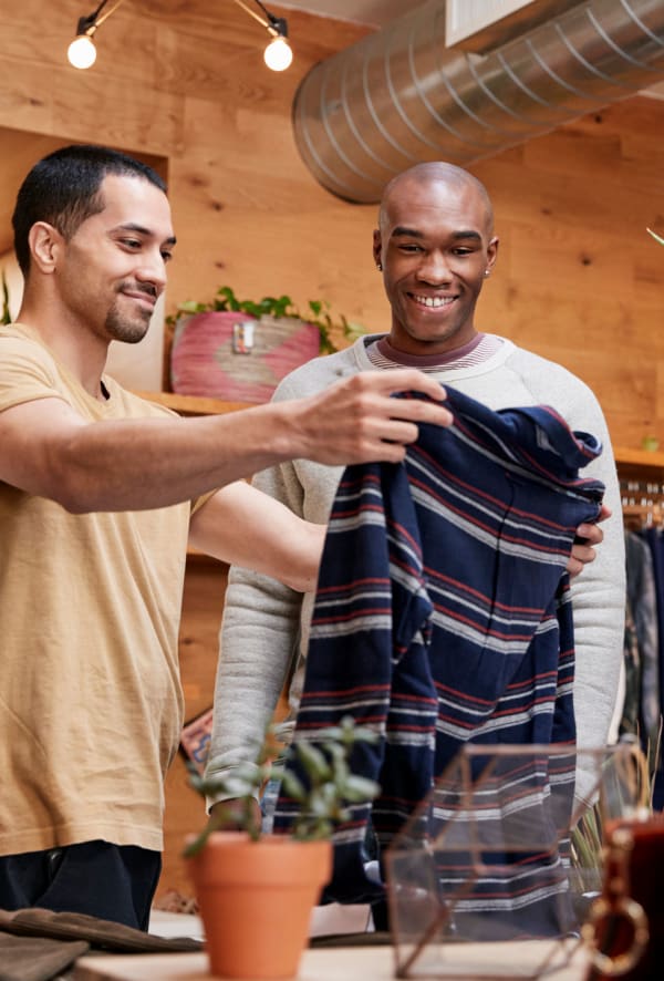Residents shopping at a boutique near Briarwood Apartments & Townhomes in State College, Pennsylvania