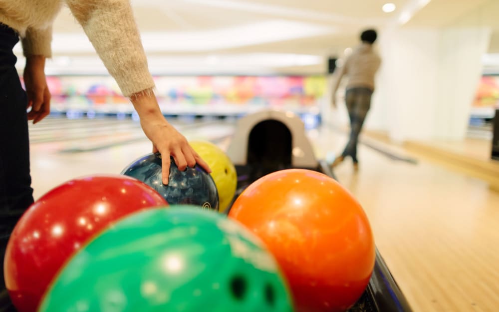 Residents bowling near Abrams Run Apartment Homes in King of Prussia, Pennsylvania