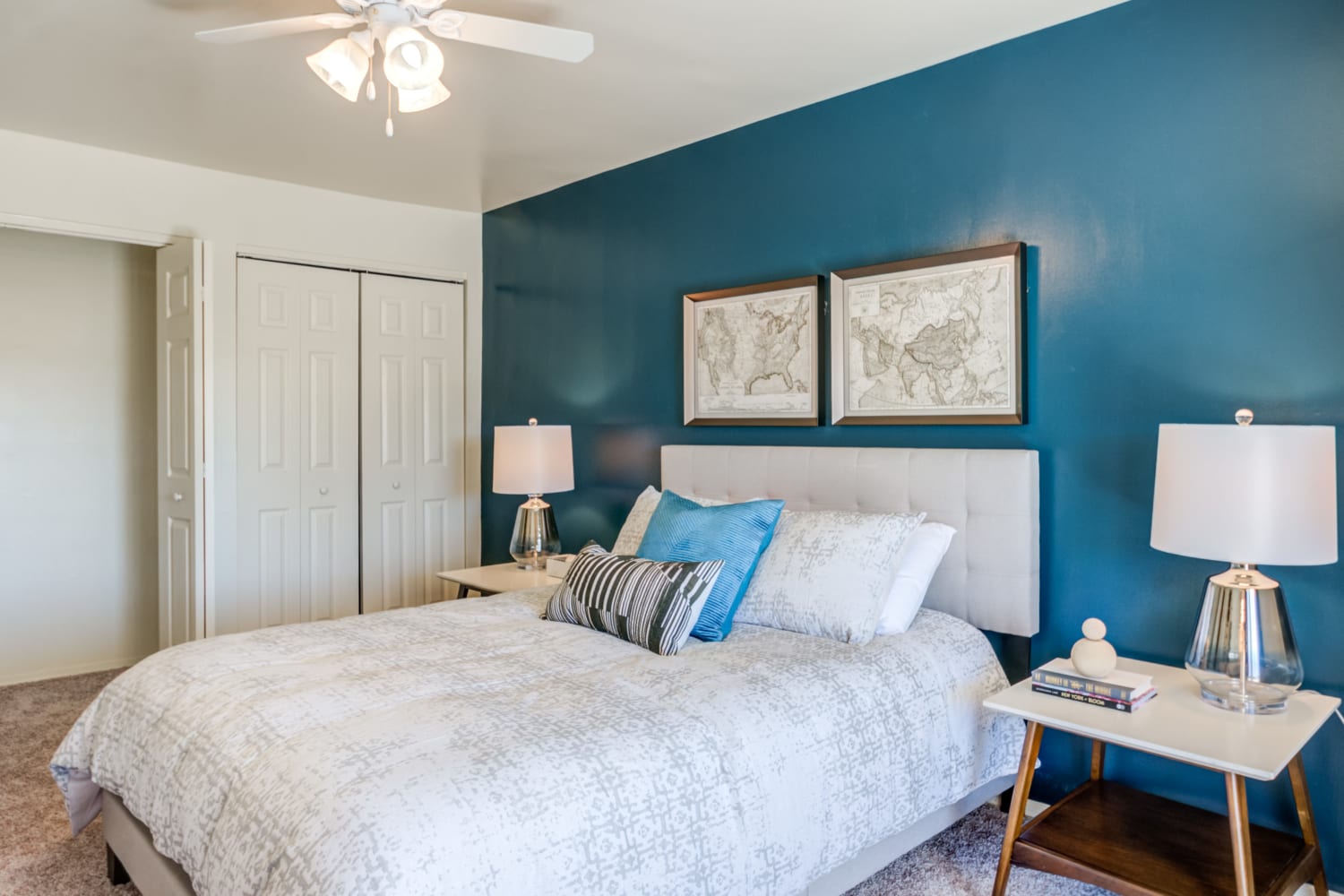 Carpeted Bedroom with a Ceiling Fan at Greentree Village Townhomes in Lebanon, Pennsylvania