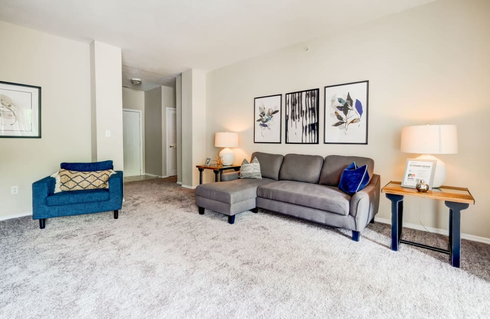 Well lit and spacious fully furnished living room located at Highlands of Montour Run in Coraopolis, Pennsylvania