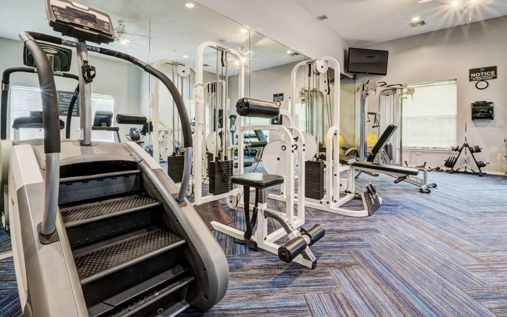 Well-equipped fitness center with cardio equipment at Highlands of Montour Run in Coraopolis, Pennsylvania