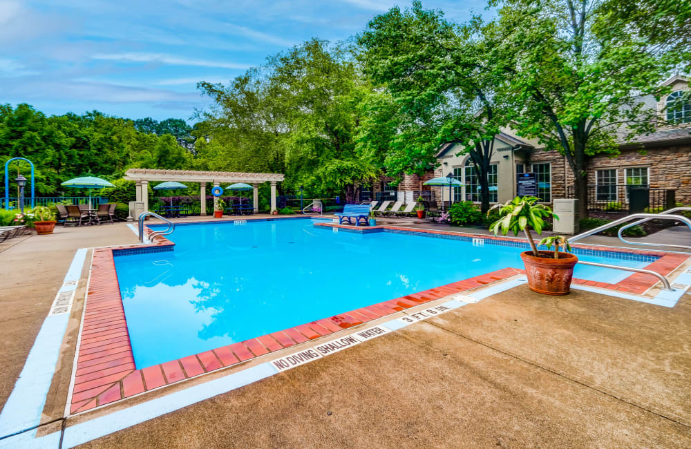 Beautiful blue sky with a luxurious pool Highlands of Montour Run in Coraopolis, Pennsylvania