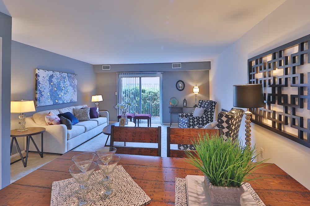 Open Layout Dining and Living Area with Ambient Lighting at Lakewood Hills Apartments & Townhomes in Harrisburg, Pennsylvania