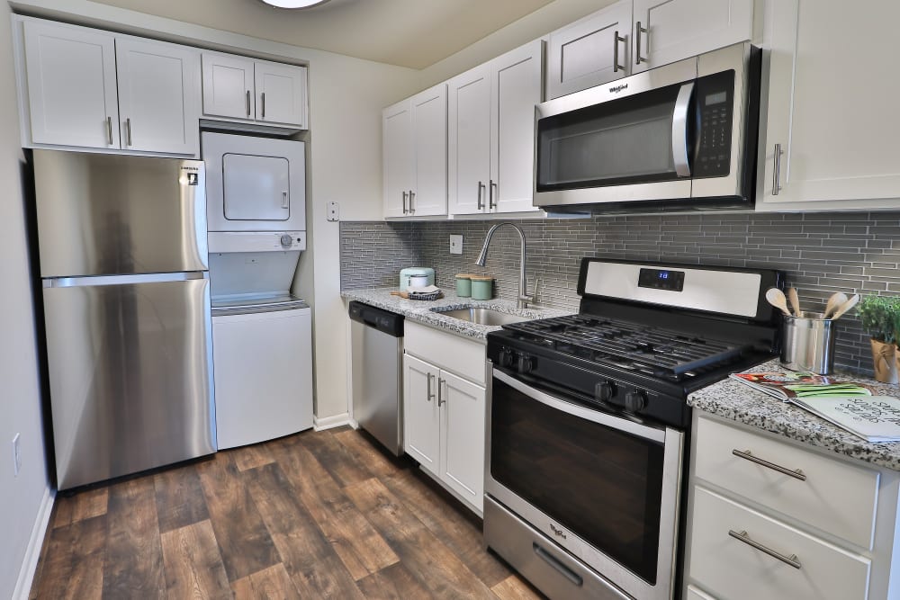 Kitchen with white cabinetry and stainless-steel appliances at Eagle's Crest Apartments in Harrisburg, Pennsylvania