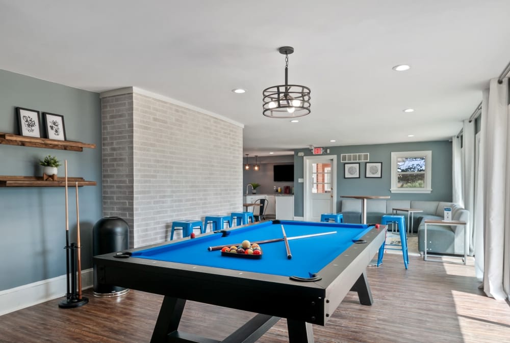 Spacious living room fully furnished with backyard access King's Manor Apartments in Harrisburg, Pennsylvania