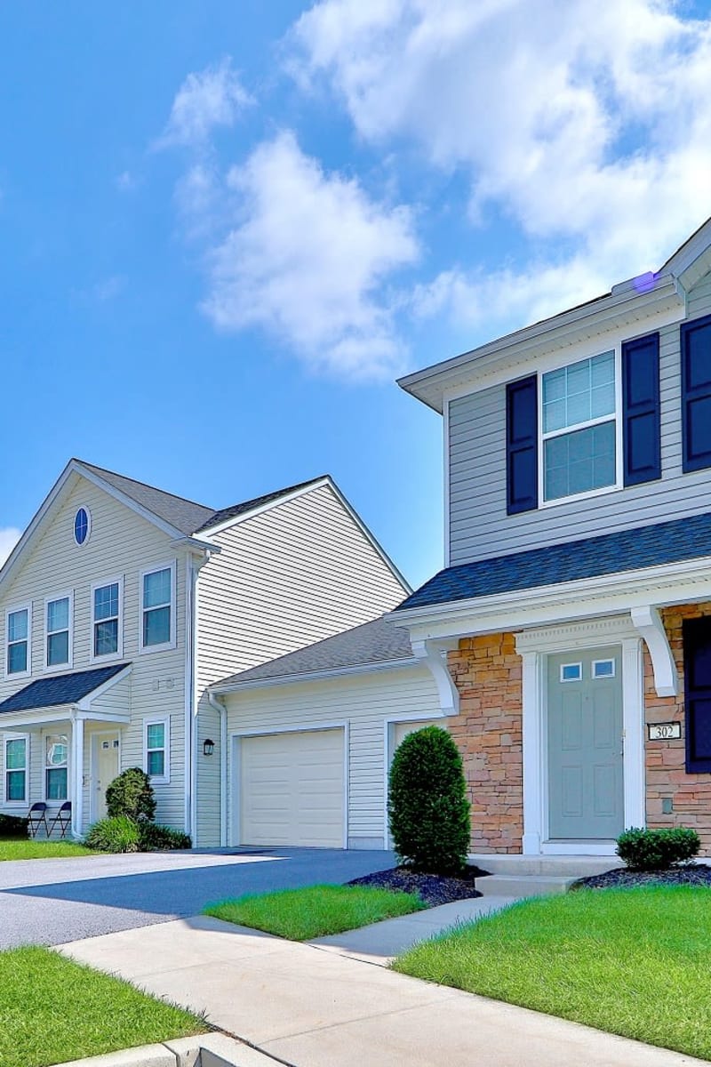 Exterior of The Village of Laurel Ridge & The Encore Apartments & Townhomes on a sunny spring day in Harrisburg, Pennsylvania