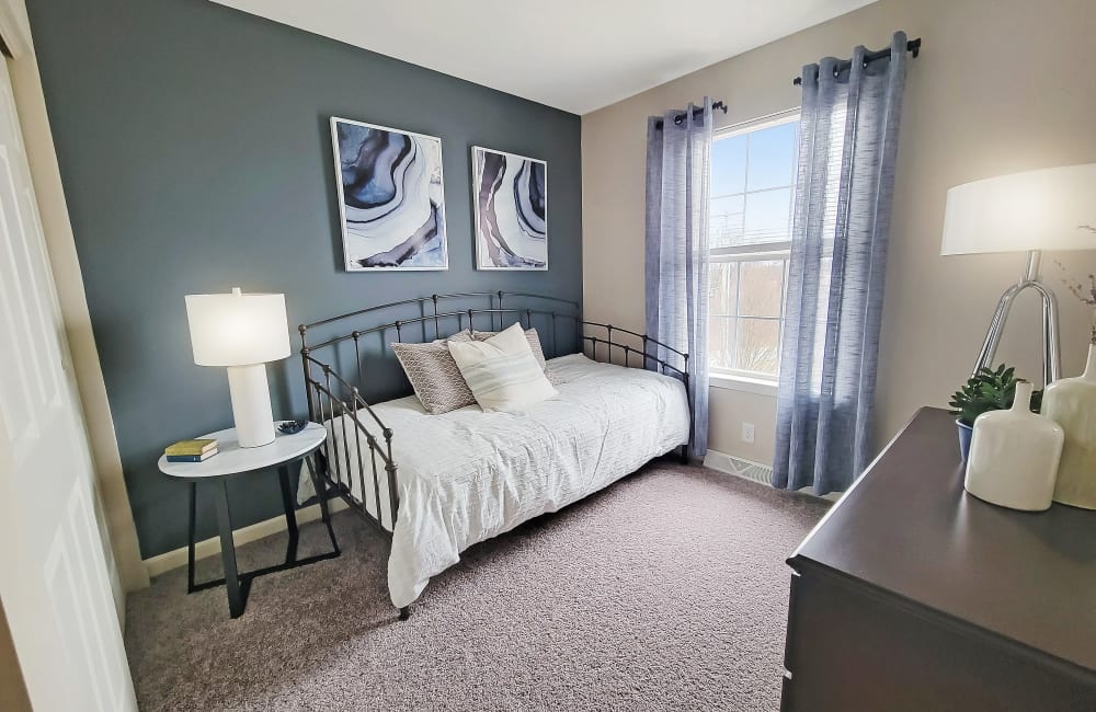 Modern and spacious bedroom with access to natural lighting at Lion's Gate in Red Lion, Pennsylvania