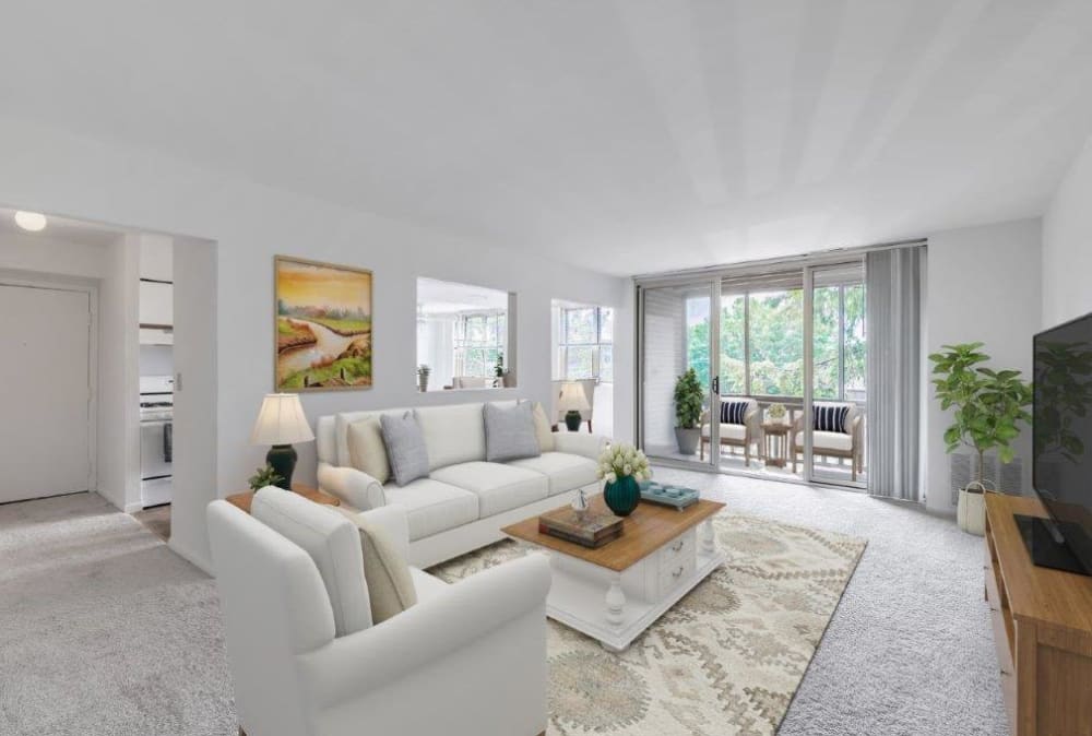 Minimalist Living Area with Plush Carpeting at Summit Pointe in Scranton, Pennsylvania