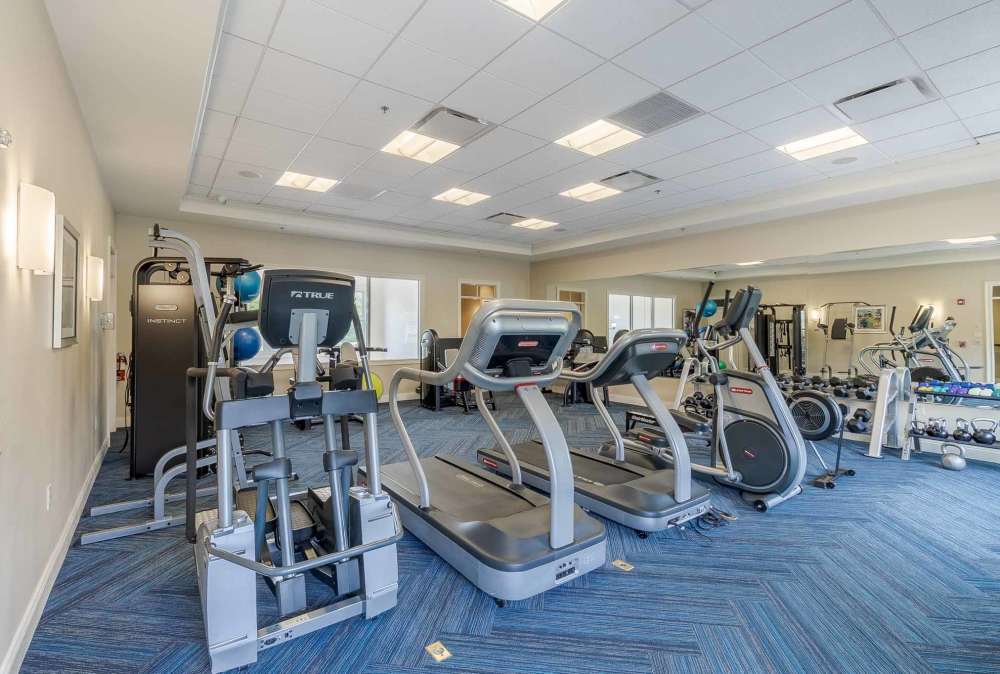 Well-equipped fitness center with cardio equipment at Marquis Place in Murrysville, Pennsylvania
