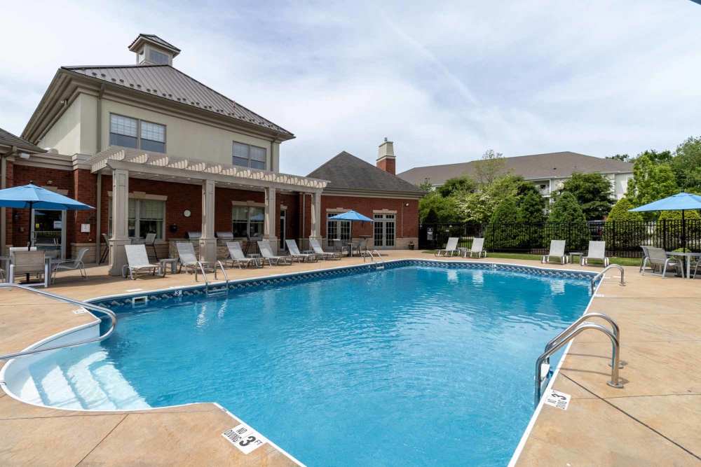 Beautiful blue sky with a luxurious pool Marquis Place in Murrysville, Pennsylvania