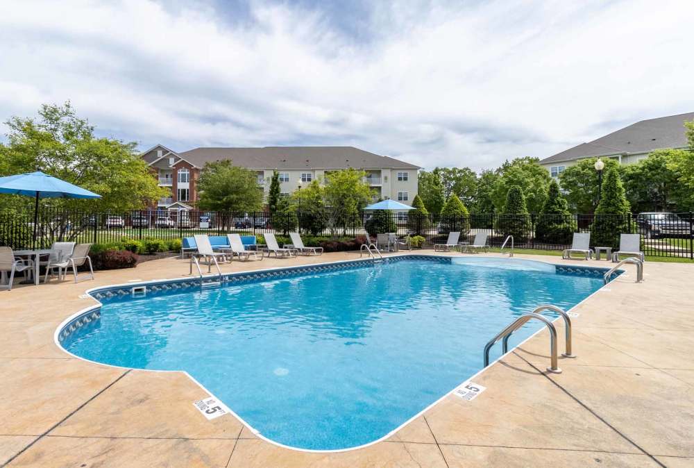 Beautiful blue sky with a luxurious pool Marquis Place in Murrysville, Pennsylvania