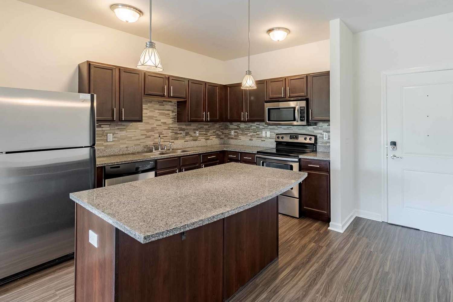 Large kitchen dinning room combo located at Marquis Place in Murrysville, Pennsylvania