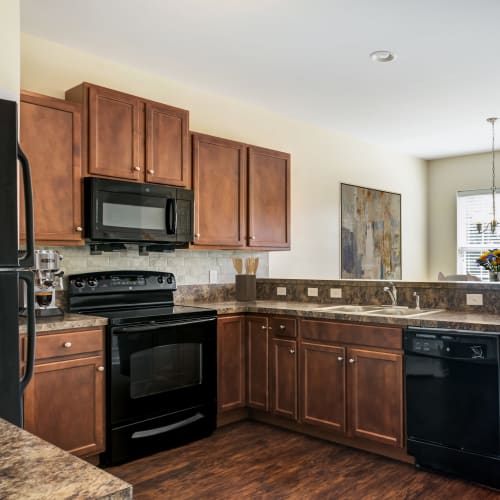 Open concept model kitchen at Emerald Pointe Townhomes in Harrisburg, Pennsylvania