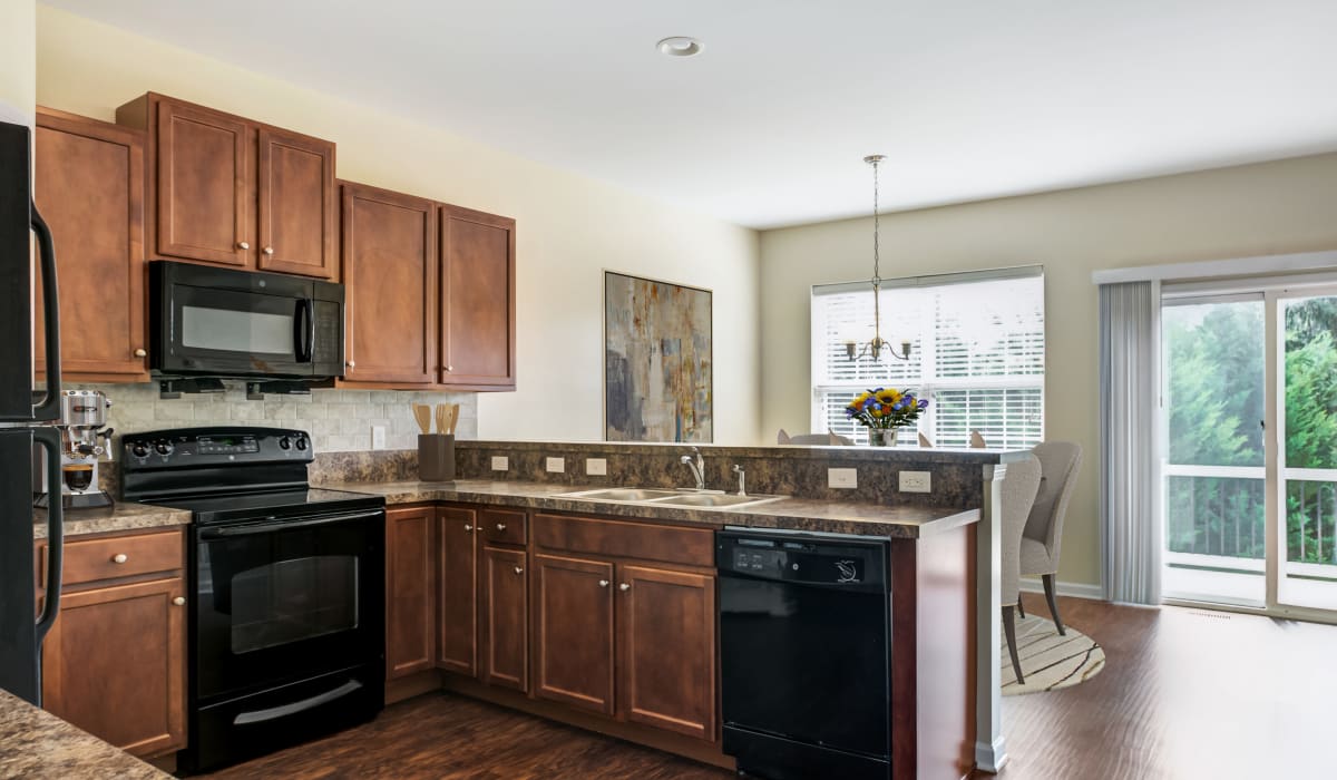 Contemorary kitchen with open layout at Emerald Pointe Townhomes in Harrisburg, Pennsylvania