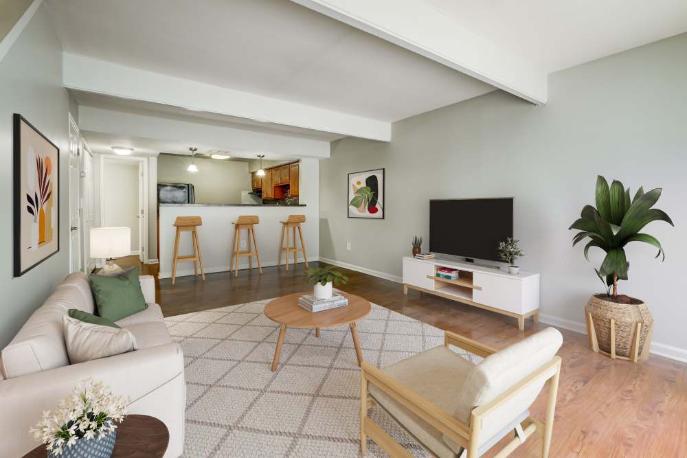 Living room with vinyl plank flooring thoughout at Nineteen North Apartments in Pittsburgh, Pennsylvania