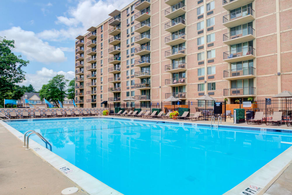 Sparkling Swimming Pool with Sun Loungers at Place One Apartment Homes in Plymouth Meeting, Pennsylvania