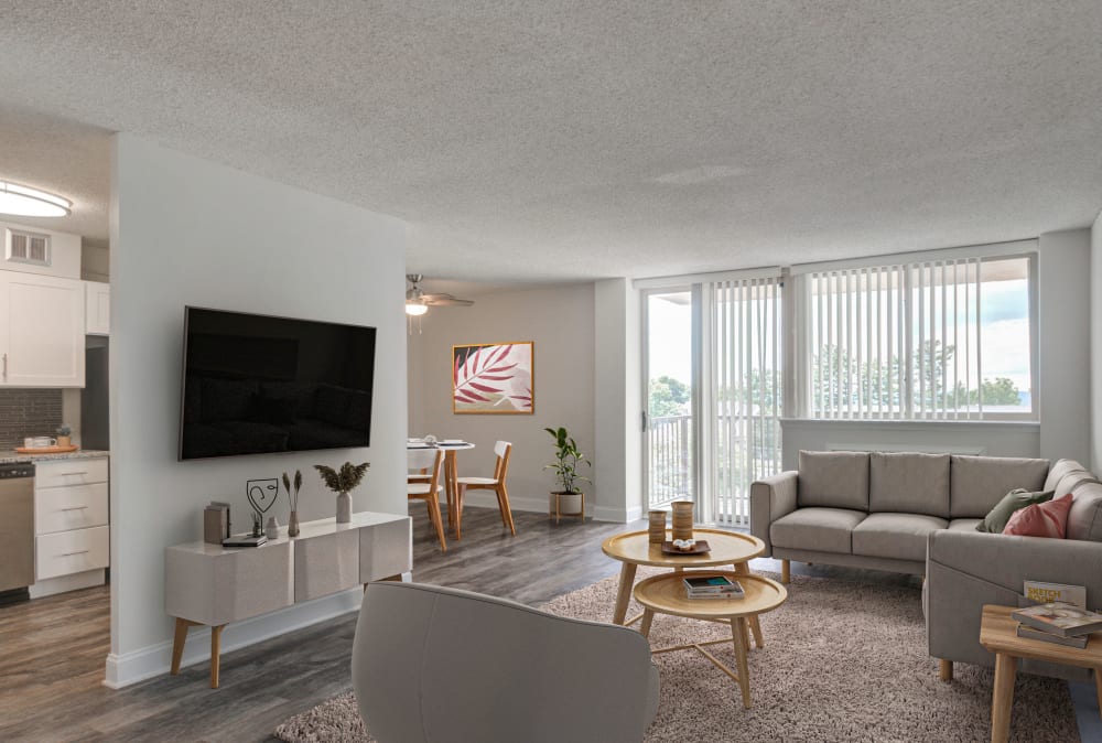 Minimalist Living Area with Hardwood Flooring at Place One Apartment Homes in Plymouth Meeting, Pennsylvania