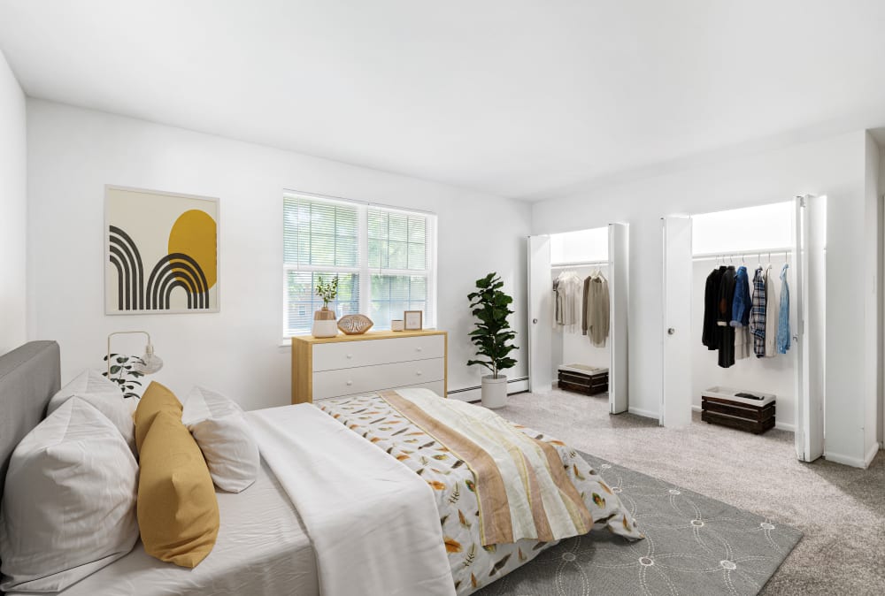 Spacious bedroom with attached closet at Roberts Mill Apartments & Townhomes in Maple Shade, New Jersey