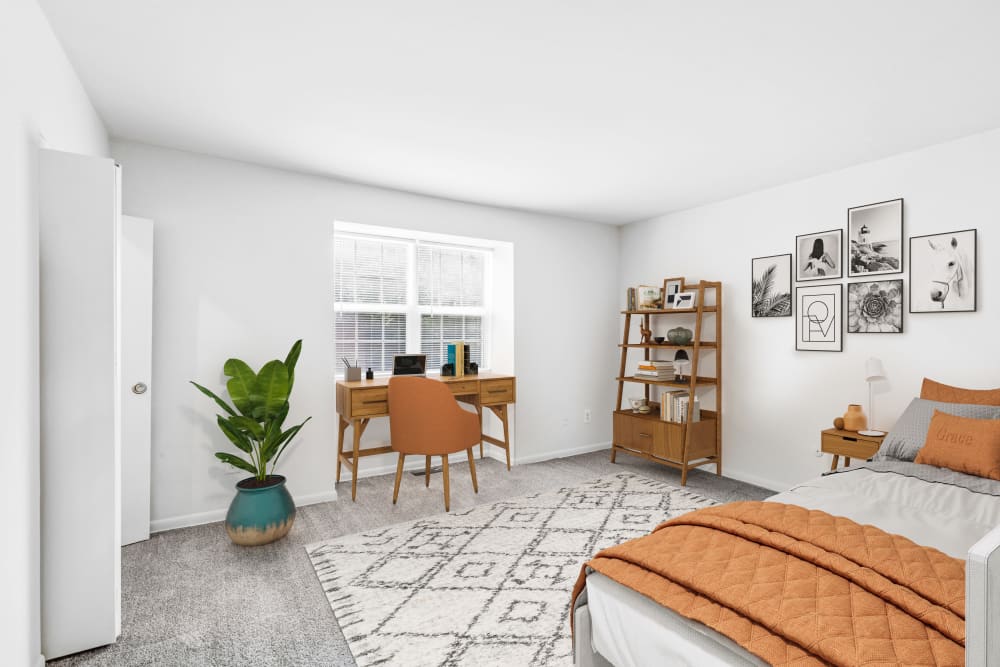 Spacious and well lit bedroom at Roberts Mill Apartments & Townhomes in Maple Shade, New Jersey