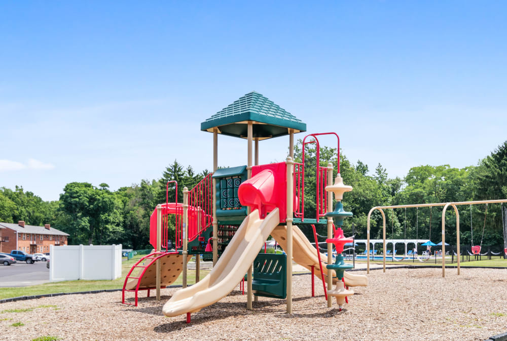 Kid's playground at Roberts Mill Apartments & Townhomes in Maple Shade, New Jersey