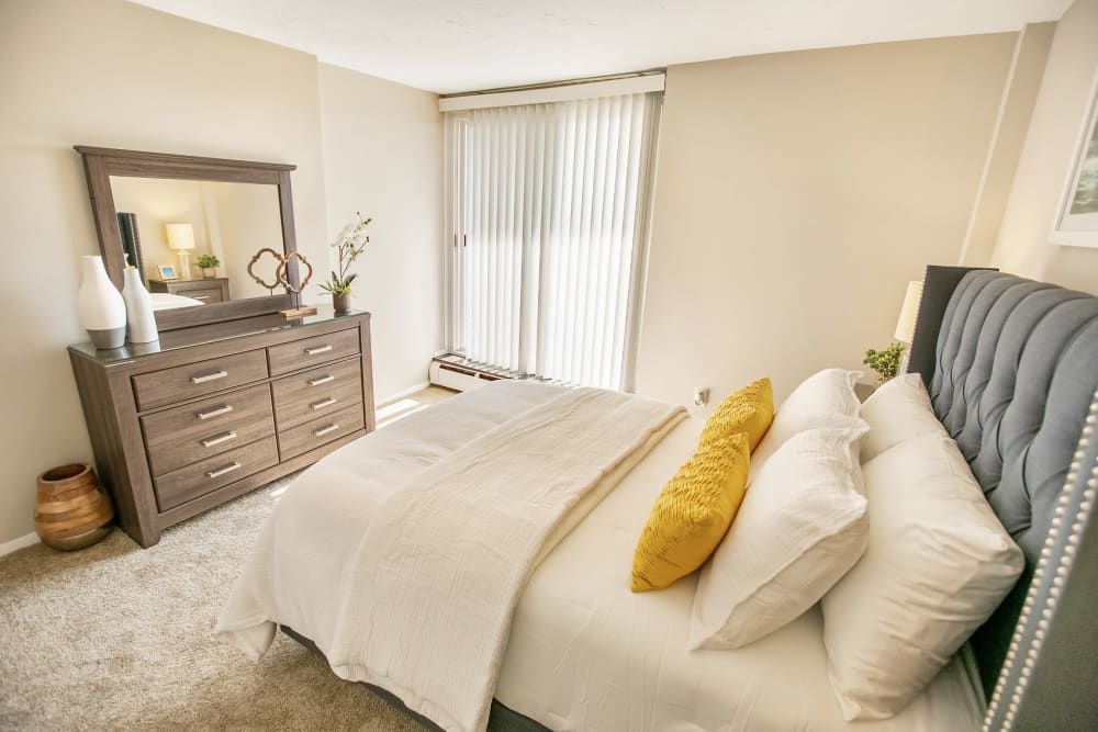 Cozy bedroom at Solon Club Apartments in Oakwood Village, Ohio